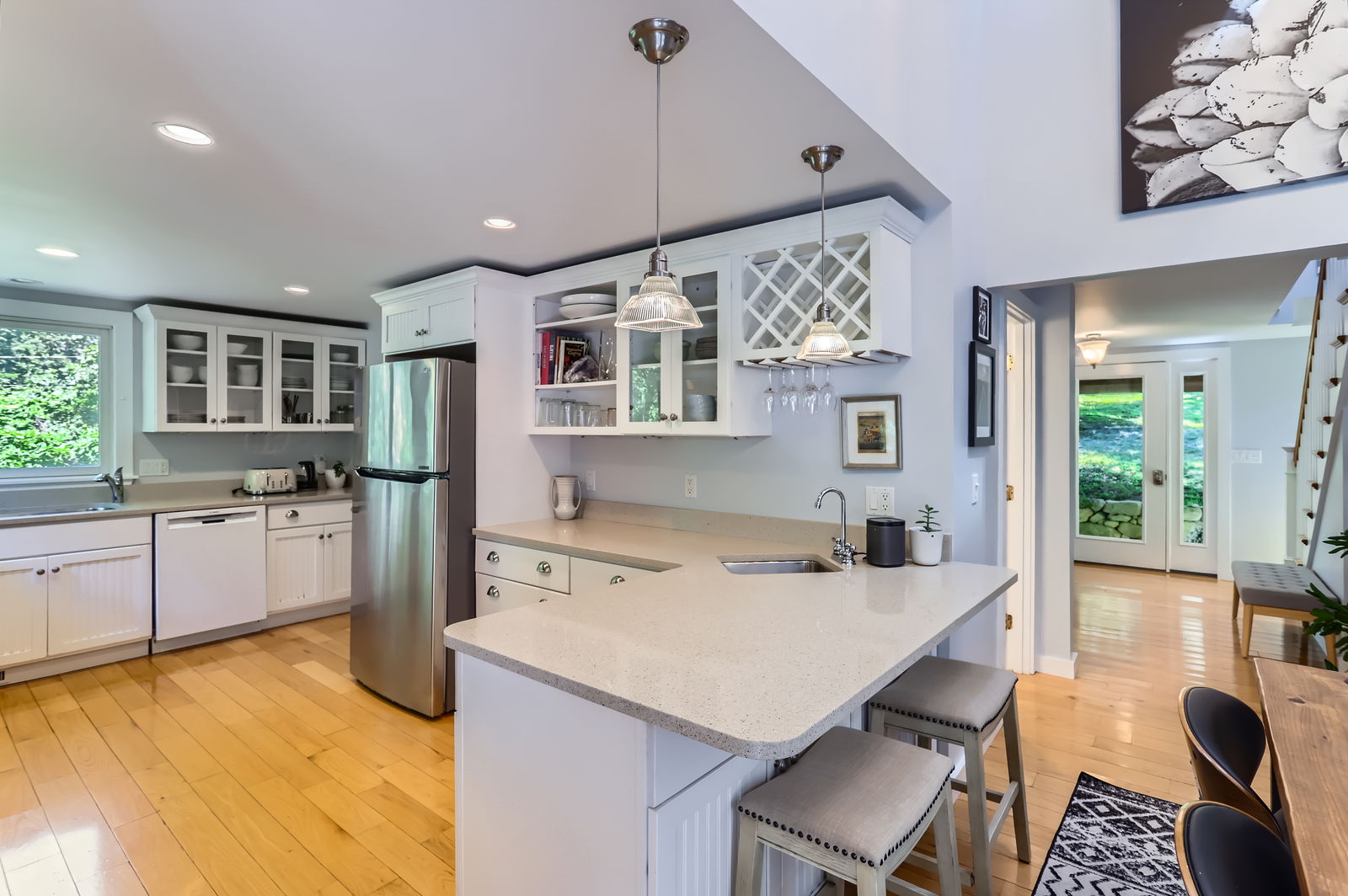 3 Fulling Mill Road Chilmark, MA 02535 - Photo 10 of 48 a kitchen with a table chairs stove and cabinets