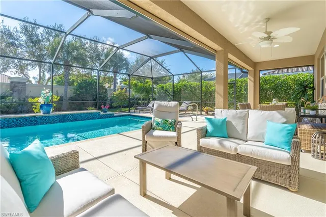 a view of a patio with swimming pool