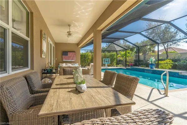 a view of an outdoor dining space with furniture