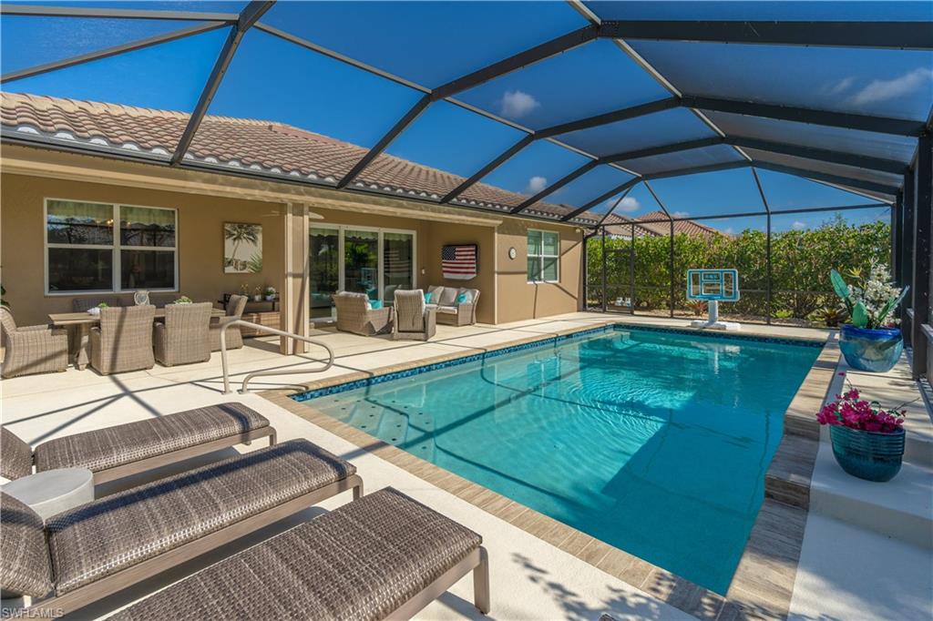 9332 Fieldstone Lane Naples, FL 34120 - Photo 34 of 41 a view of a backyard with sitting area