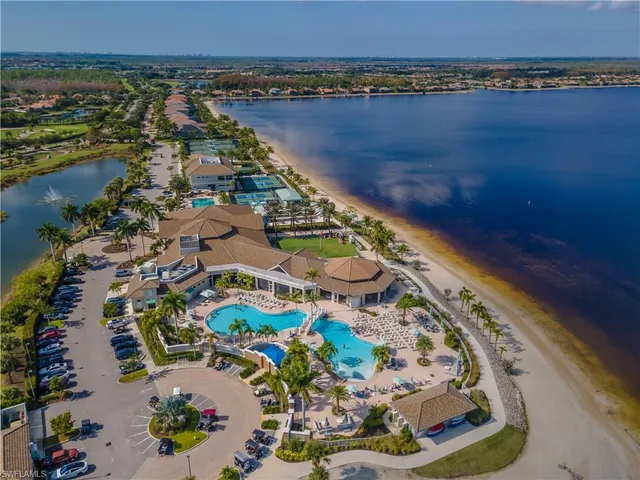 an aerial view of lake and mountain
