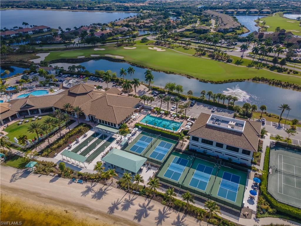9332 Fieldstone Lane Naples, FL 34120 - Photo 38 of 41 an aerial view of a house with a lake view