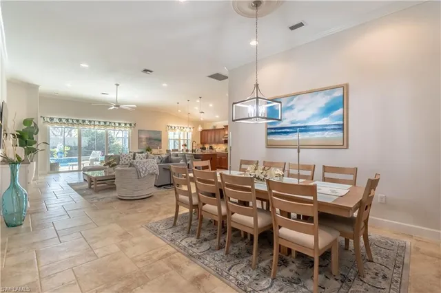 a dining room with lots of tables and chairs