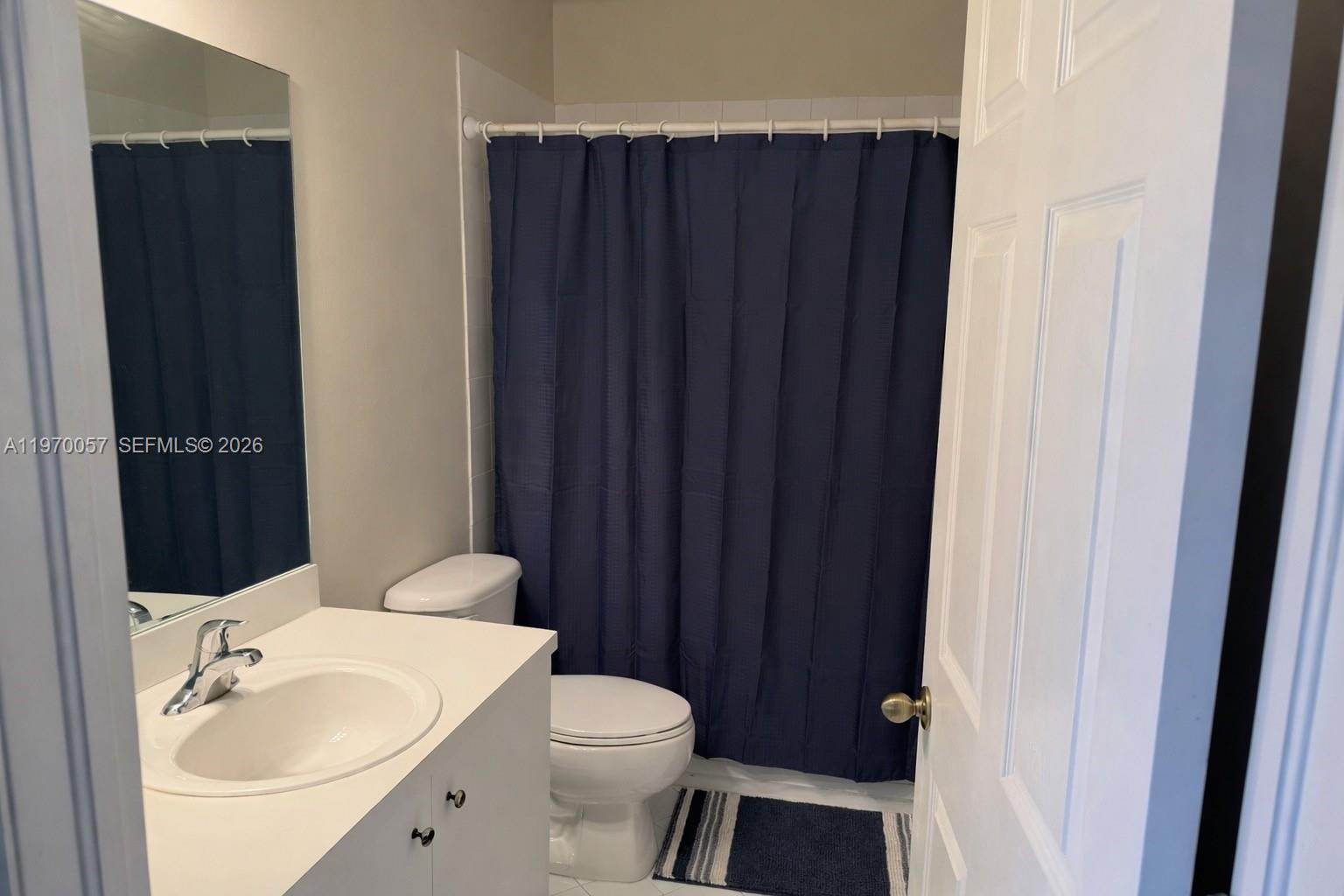 1485 Northeast 33rd Road, Unit 207 Homestead, FL 33033 - Photo 6 of 10 a bathroom with a sink and a toilet