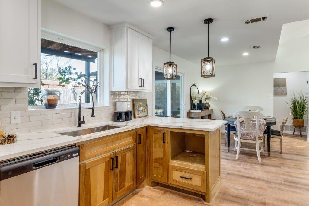3121 Damascus Way Farmers Branch, TX 75234 - Photo 13 of 25 a kitchen with a sink a counter space appliances and a counter top space