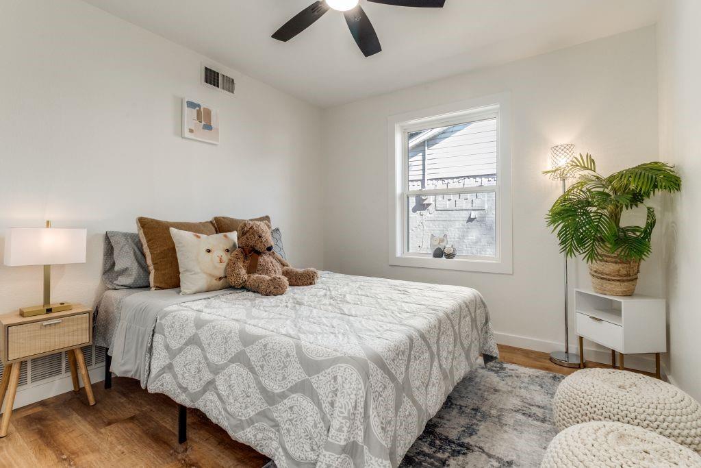 3121 Damascus Way Farmers Branch, TX 75234 - Photo 17 of 25 a bedroom with bed and a window