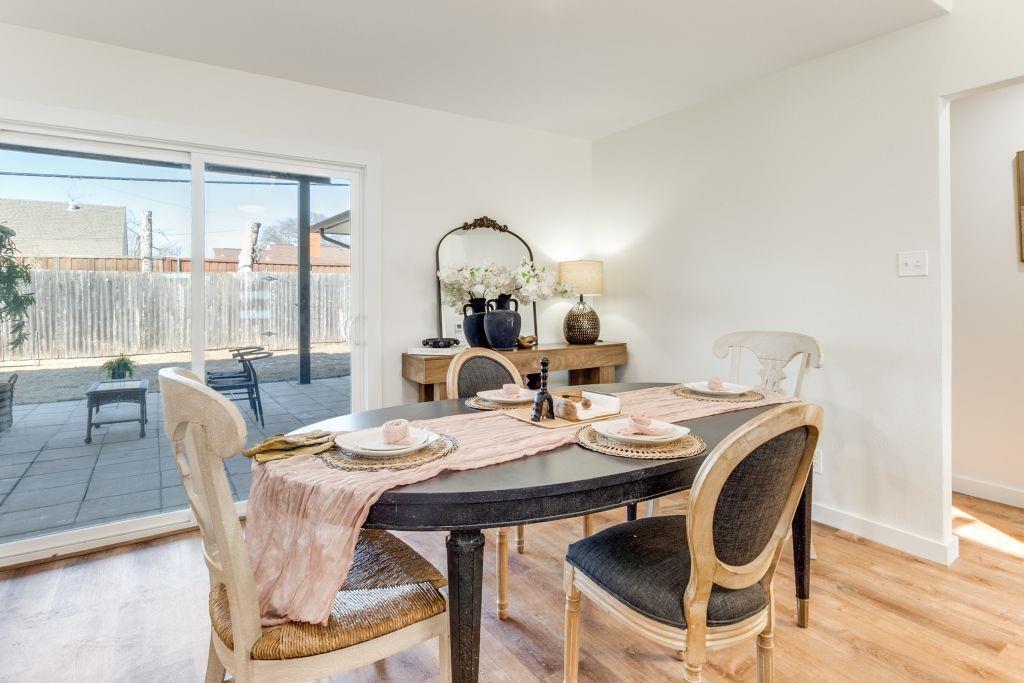 3121 Damascus Way Farmers Branch, TX 75234 - Photo 9 of 25 a view of a dining room with furniture window and wooden floor