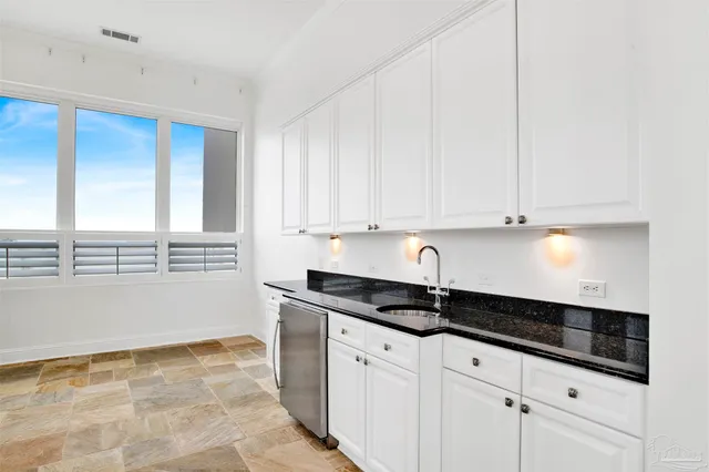 a bathroom with a tub and shower