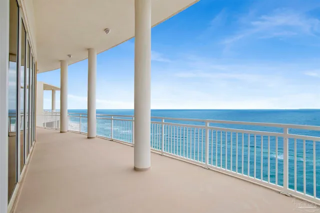 a view of kitchen with kitchen island stainless steel appliances refrigerator oven and cabinets