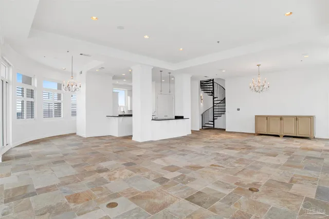 a view of a hallway with stairs