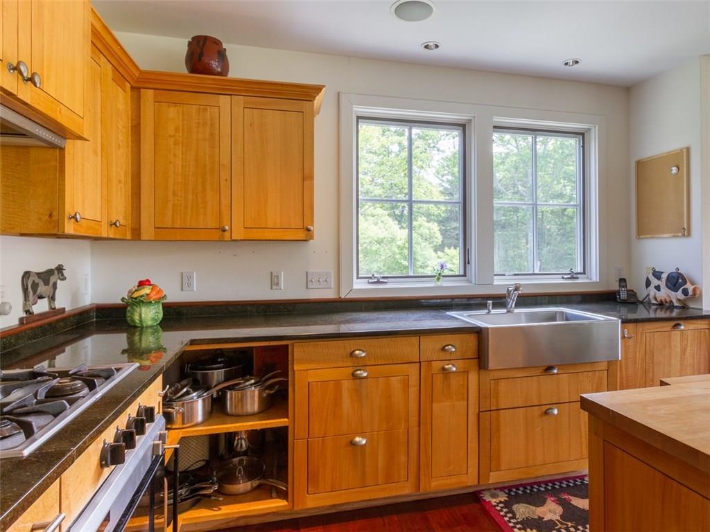 53 Whitney Farm Road Mount Desert, ME 04660 - Photo 22 of 35 The kitchen features a stainless...