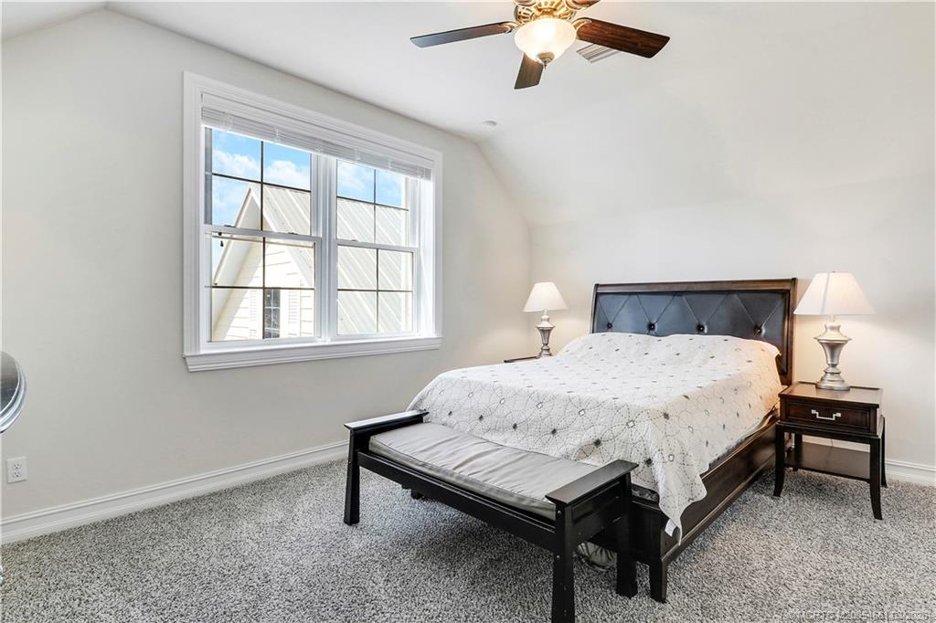 5352 Southeast Nassau Terrace Stuart, FL 34997 - Photo 37 of 53 a bedroom with a bed and a window