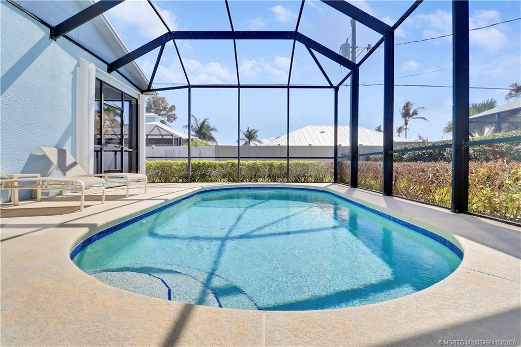 5352 Southeast Nassau Terrace Stuart, FL 34997 - Photo 44 of 53 a view of a swimming pool