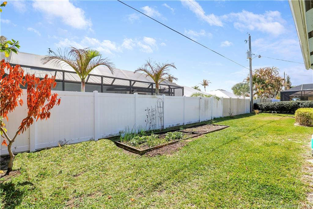 5352 Southeast Nassau Terrace Stuart, FL 34997 - Photo 50 of 53 a view of a backyard