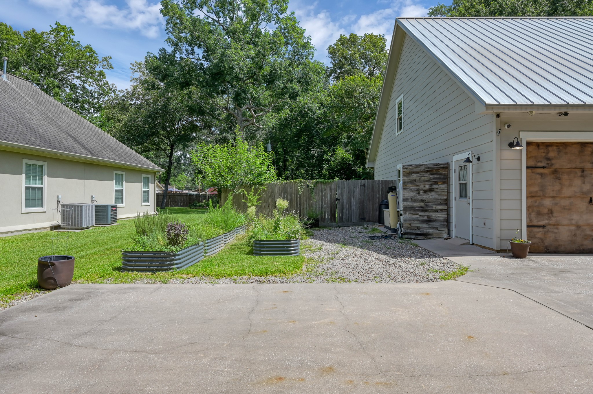 1615 Melissa Drive Spring, TX 77386 - Photo 35 of 40 Driveway view to side of house