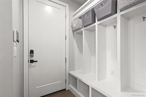 a bathroom with a shower and a sink