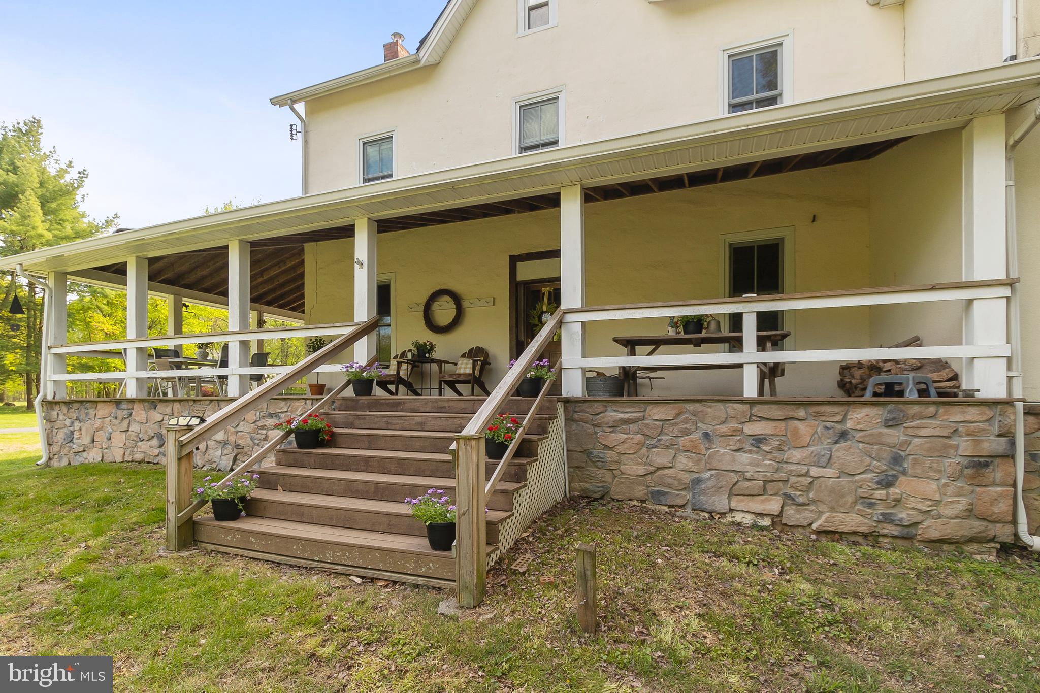 1027 Kirk Road Garnet Valley, PA 19060 - Photo 4 of 63 Up the front stairs leads to the wrap around porch