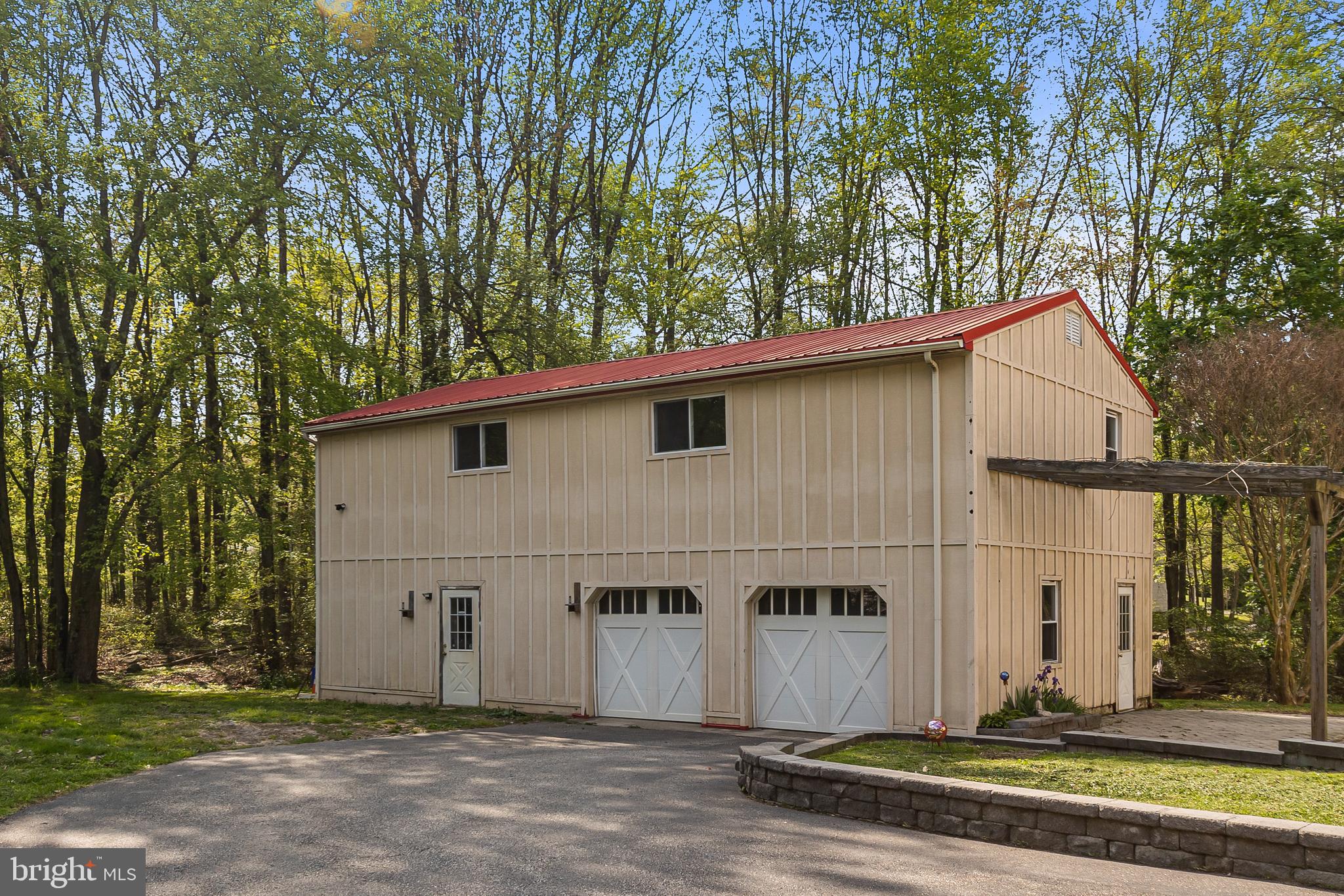 1027 Kirk Road Garnet Valley, PA 19060 - Photo 10 of 63 The garage has two spots inside as well as storage