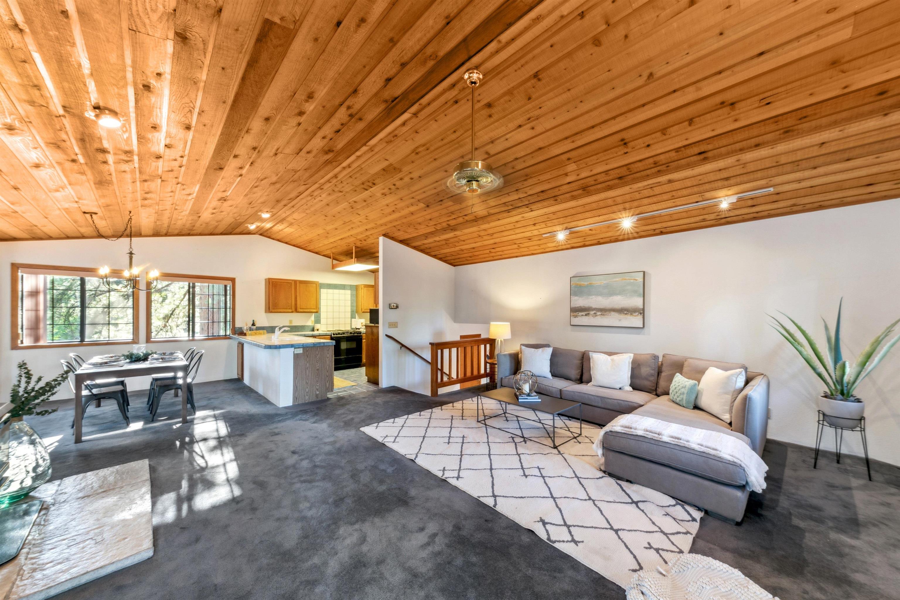 10625 Royal Crest Drive Truckee, CA 96161 - Photo 11 of 28 a living room with furniture and a kitchen