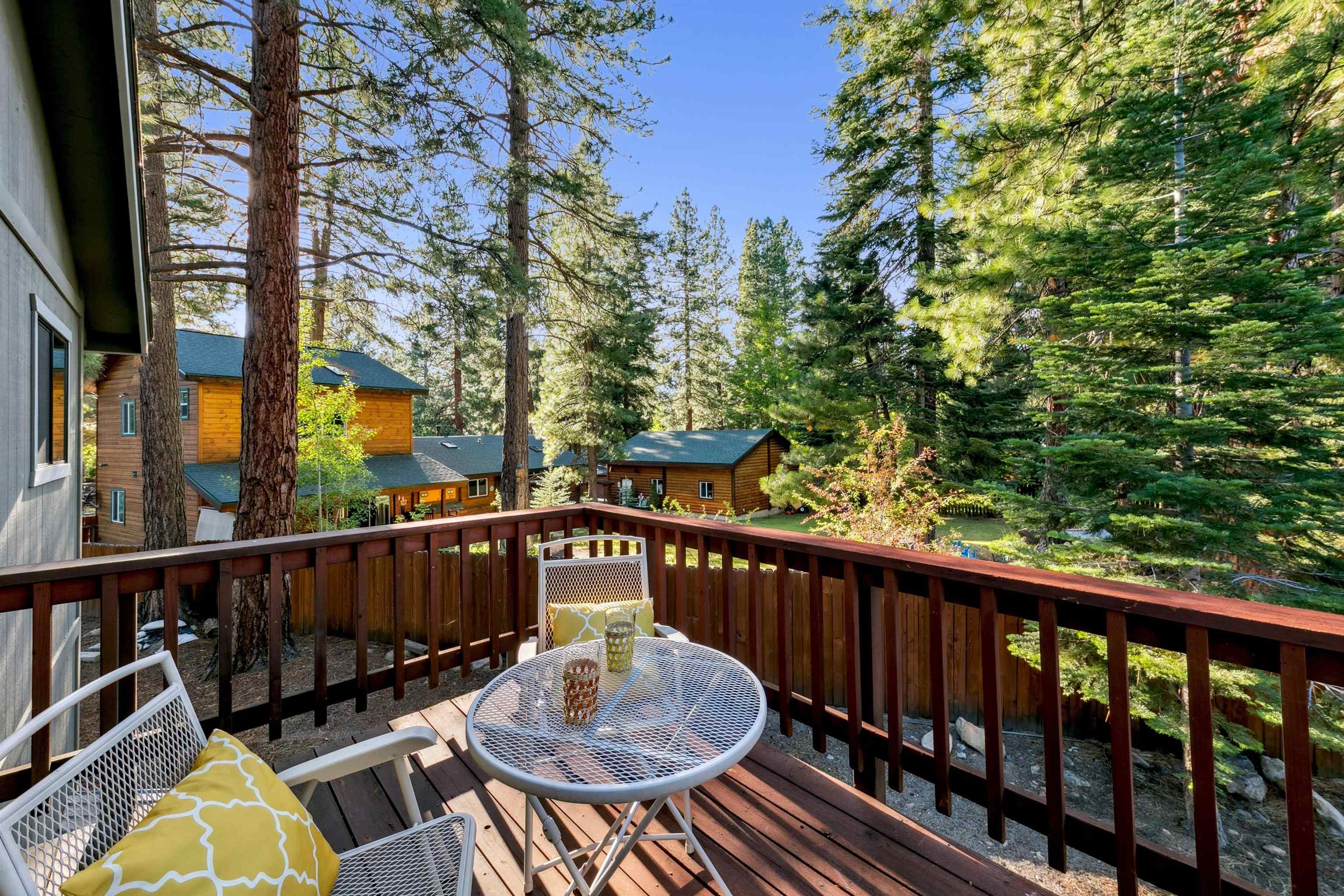10625 Royal Crest Drive Truckee, CA 96161 - Photo 23 of 28 a view of a balcony with wooden floor and outdoor seating