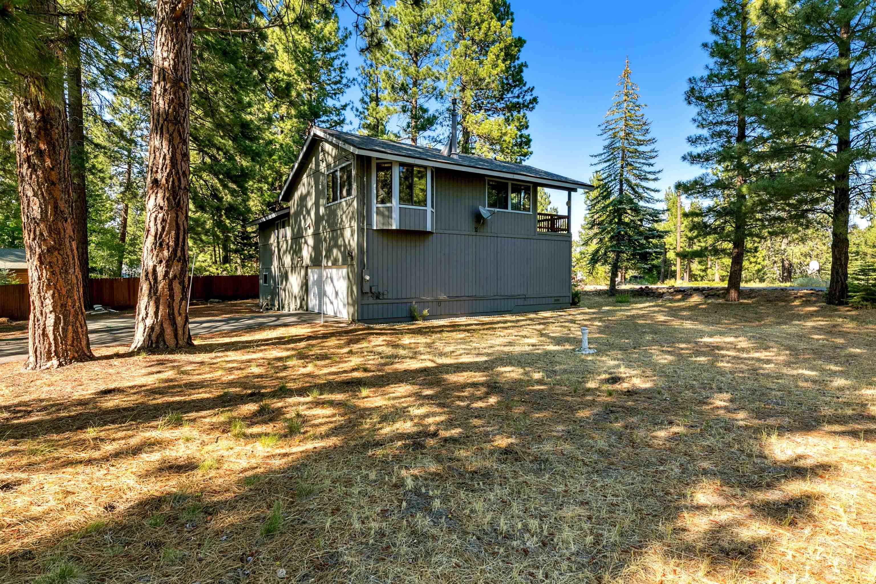 10625 Royal Crest Drive Truckee, CA 96161 - Photo 6 of 28 a front view of a house with a tree
