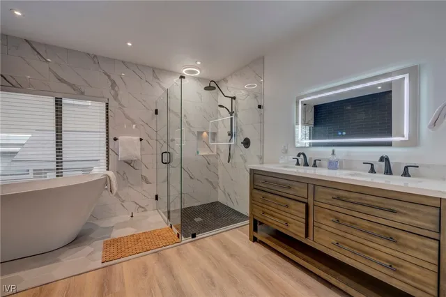 a bathroom with a bathtub and a sink