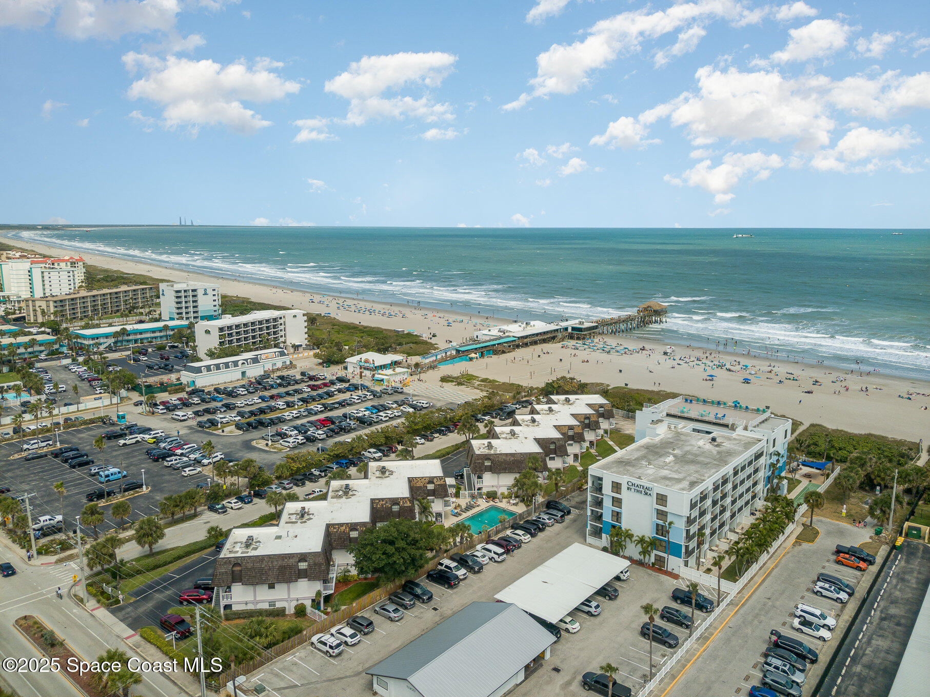 5350 Ocean Beach Boulevard, Unit 211 Cocoa Beach, FL 32931 - Photo 29 of 37 an aerial view of beach and ocean