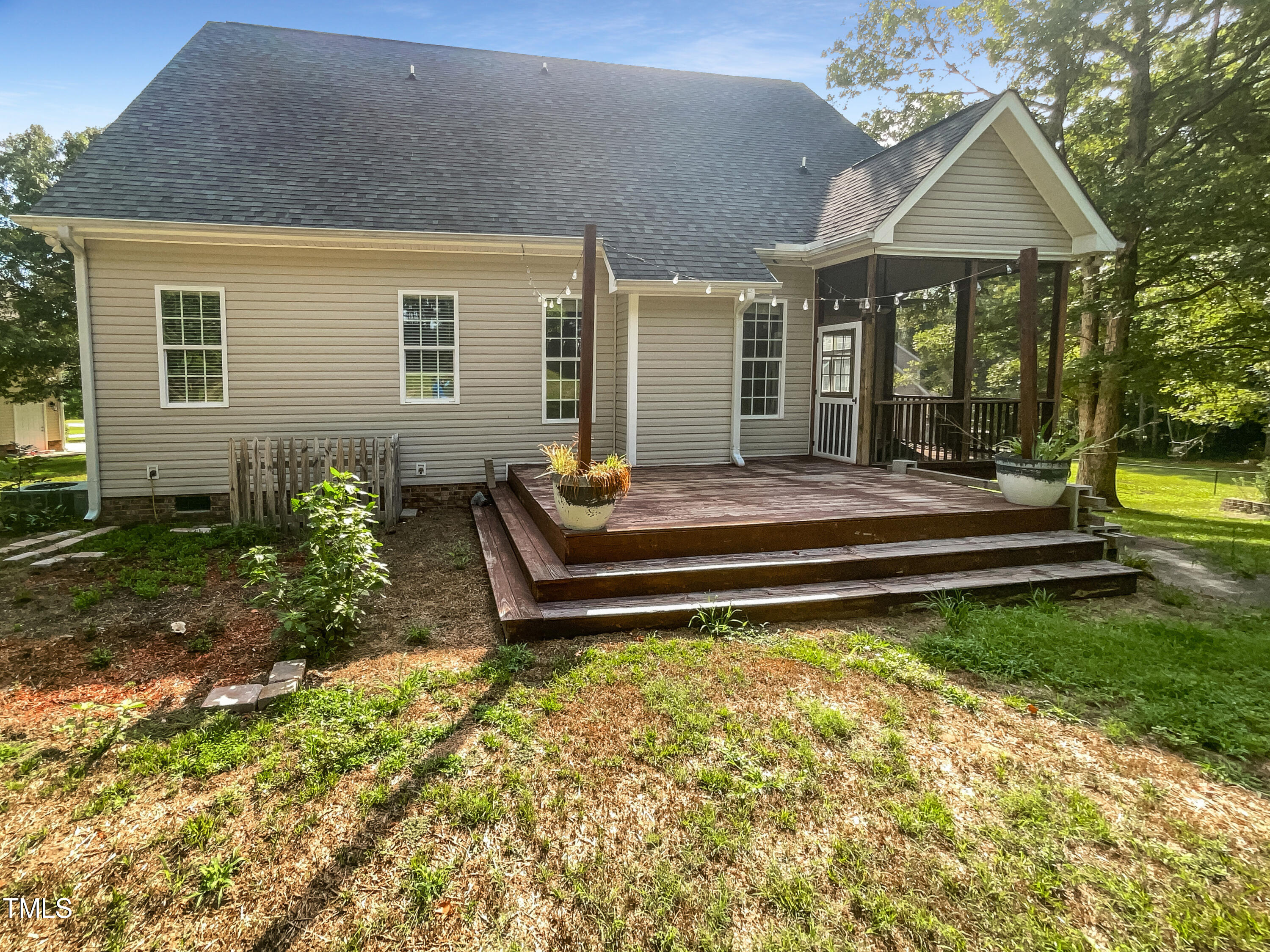 90 Carrousel Court Angier, NC 27501 - Photo 12 of 31 a view of a house with backyard and sitting area