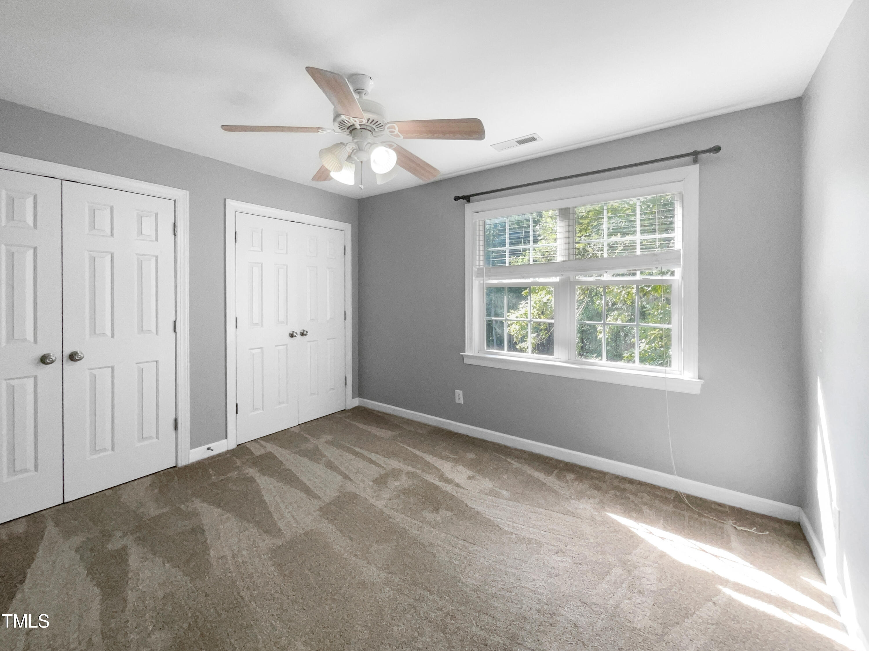 90 Carrousel Court Angier, NC 27501 - Photo 18 of 31 a view of an empty room with a window