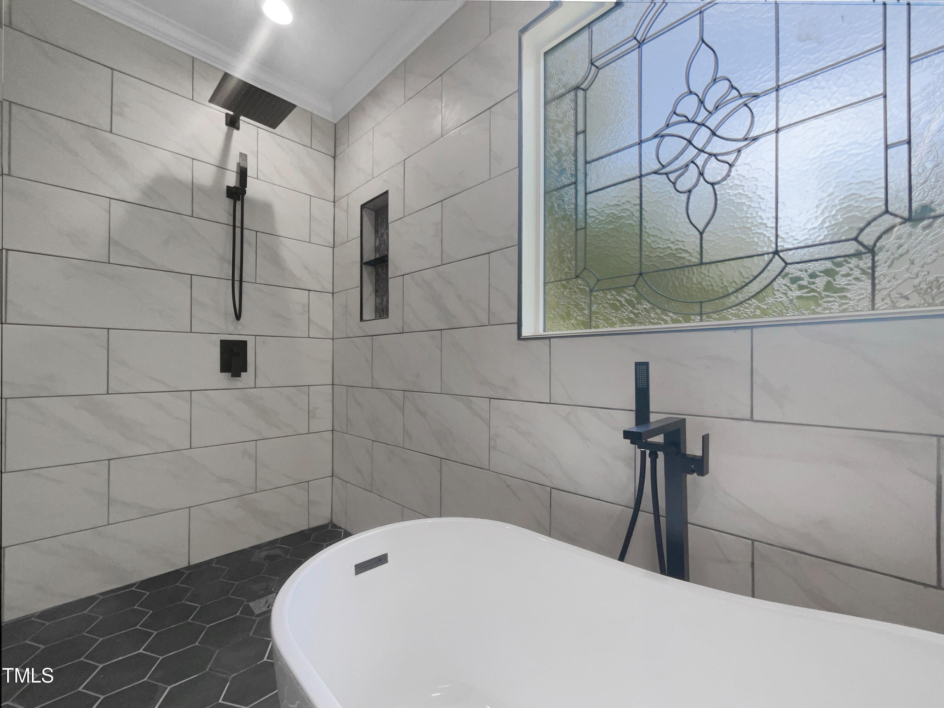 90 Carrousel Court Angier, NC 27501 - Photo 27 of 31 a bathroom with a bathtub
