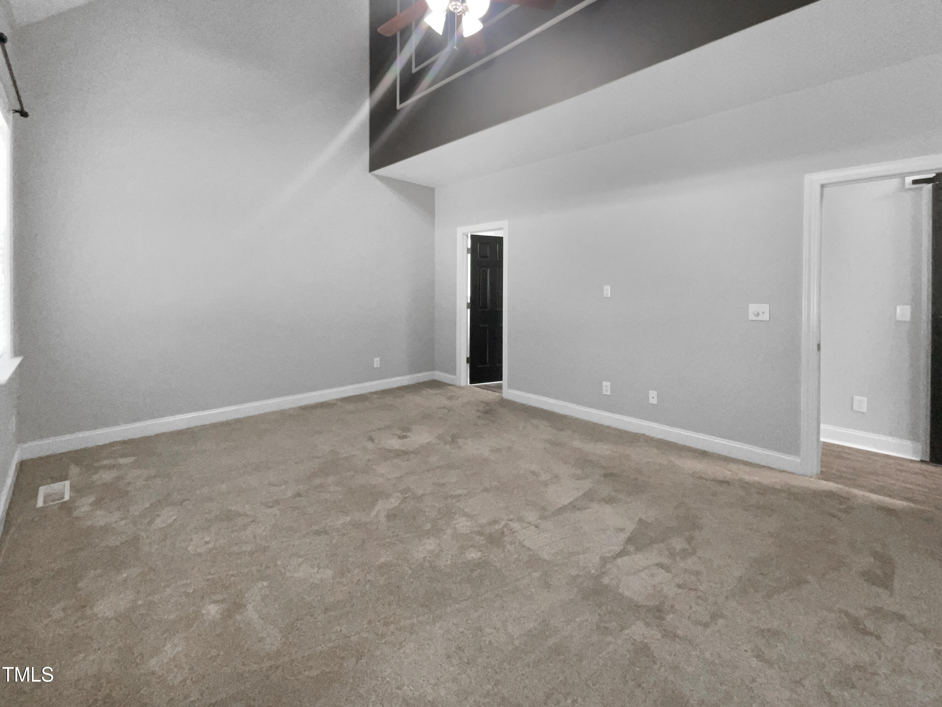 90 Carrousel Court Angier, NC 27501 - Photo 6 of 31 an empty room with an entryway