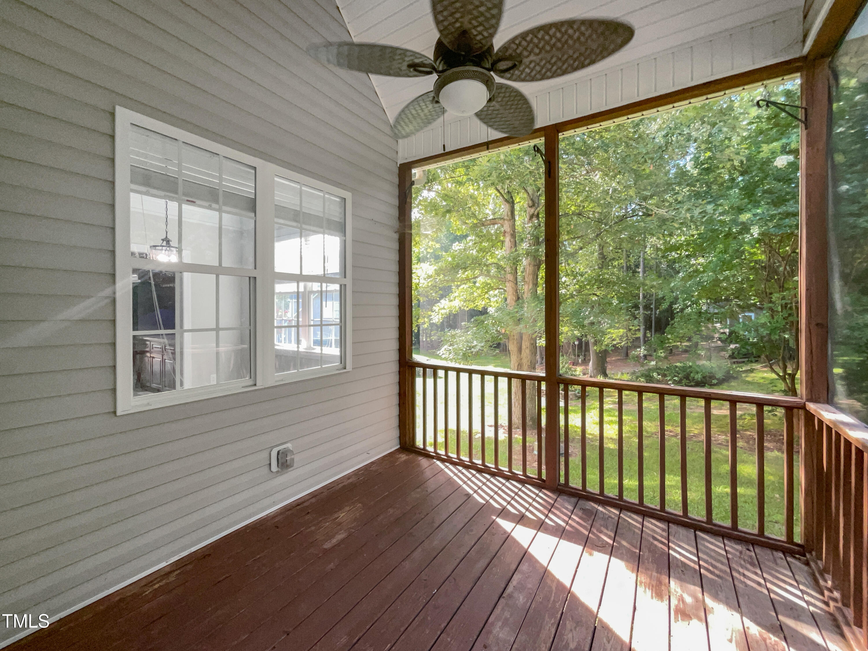 90 Carrousel Court Angier, NC 27501 - Photo 9 of 31 a view of a porch with wooden floor and outdoor space