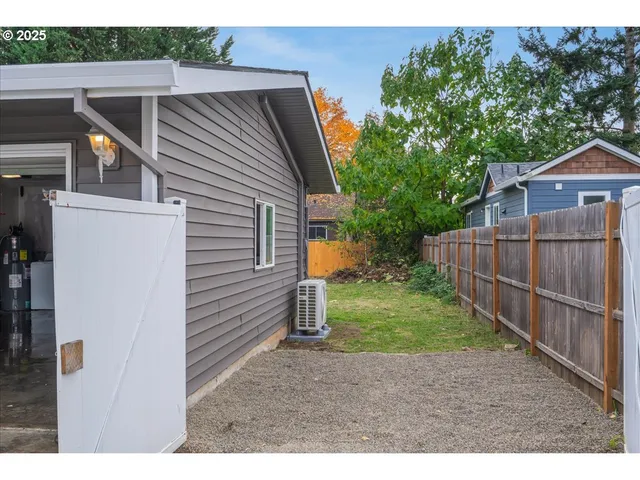 a backyard of a house with lots of green space