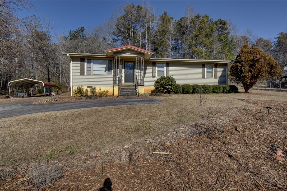 319 Cove Creek Road Pickens, SC 29671 - Photo 1 of 22 This cozy residence offers comfortable living in a serene natural setting.
