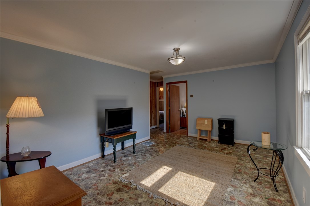 319 Cove Creek Road Pickens, SC 29671 - Photo 17 of 22 This living area offers a canvas for personalized comfort and style.