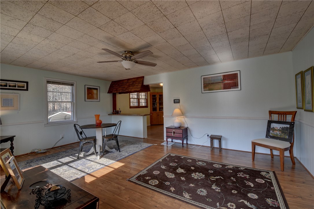 319 Cove Creek Road Pickens, SC 29671 - Photo 10 of 22 This inviting space features durable flooring and a distinct kitchen pass-through.