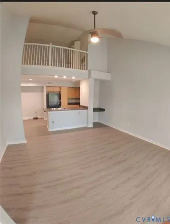a view of a livingroom with a staircase