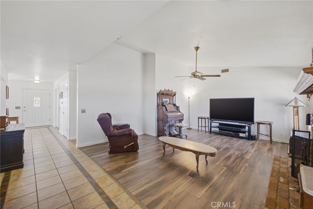 19992 Covell Street Riverside, CA 92508 - Photo 12 of 57 a living room with furniture and a flat screen tv
