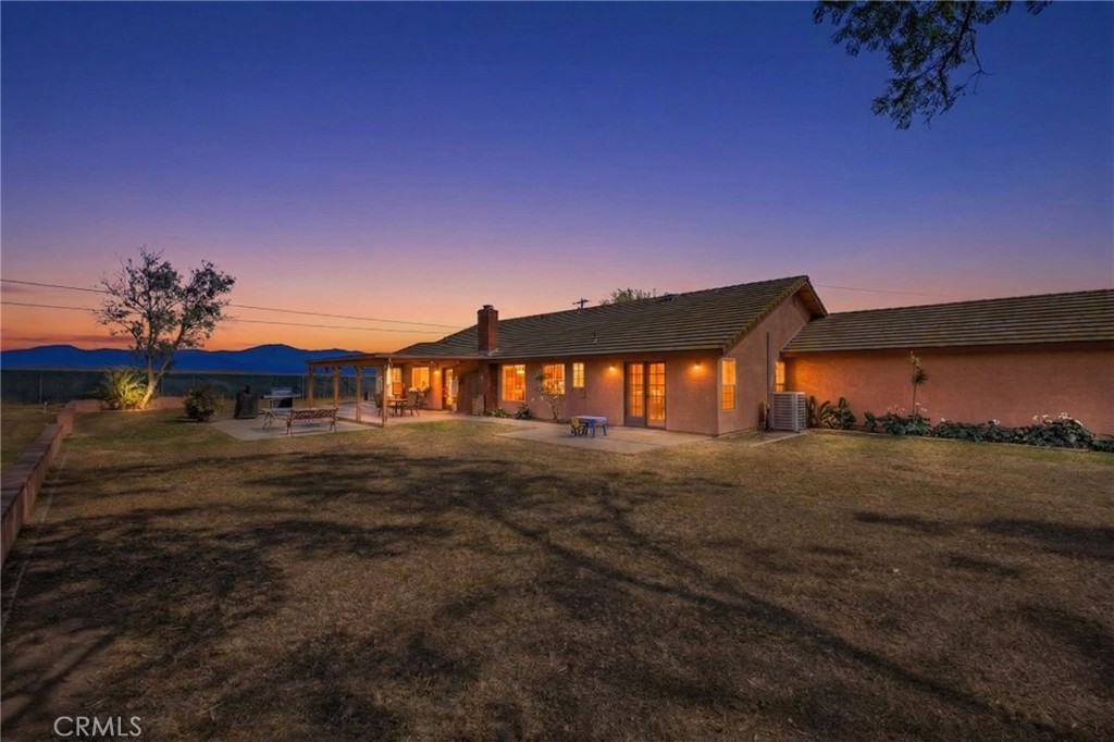 19992 Covell Street Riverside, CA 92508 - Photo 45 of 57 a view of a house with a yard