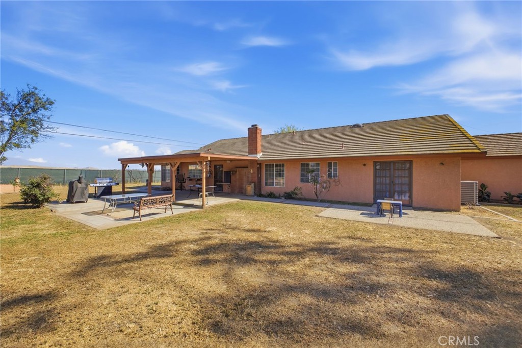 19992 Covell Street Riverside, CA 92508 - Photo 55 of 57 a view of a house with swimming pool and sitting area