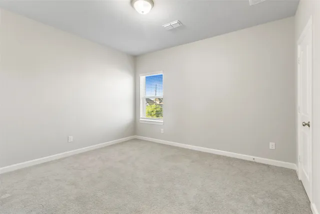 an empty room with window