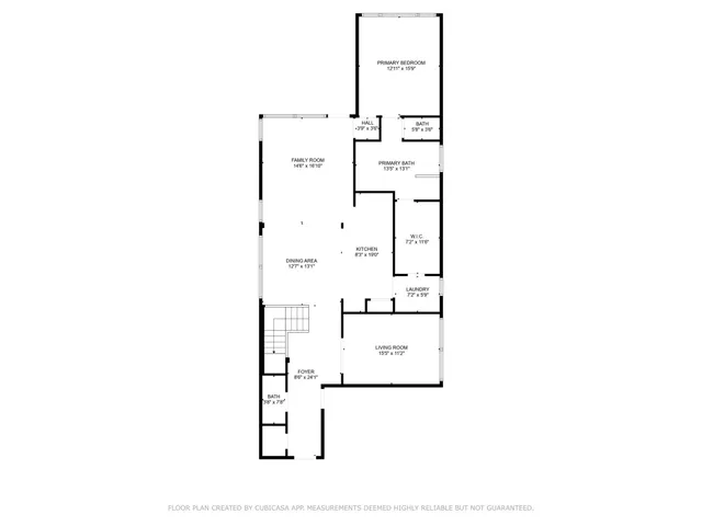 a picture of floor with a white wall and clock