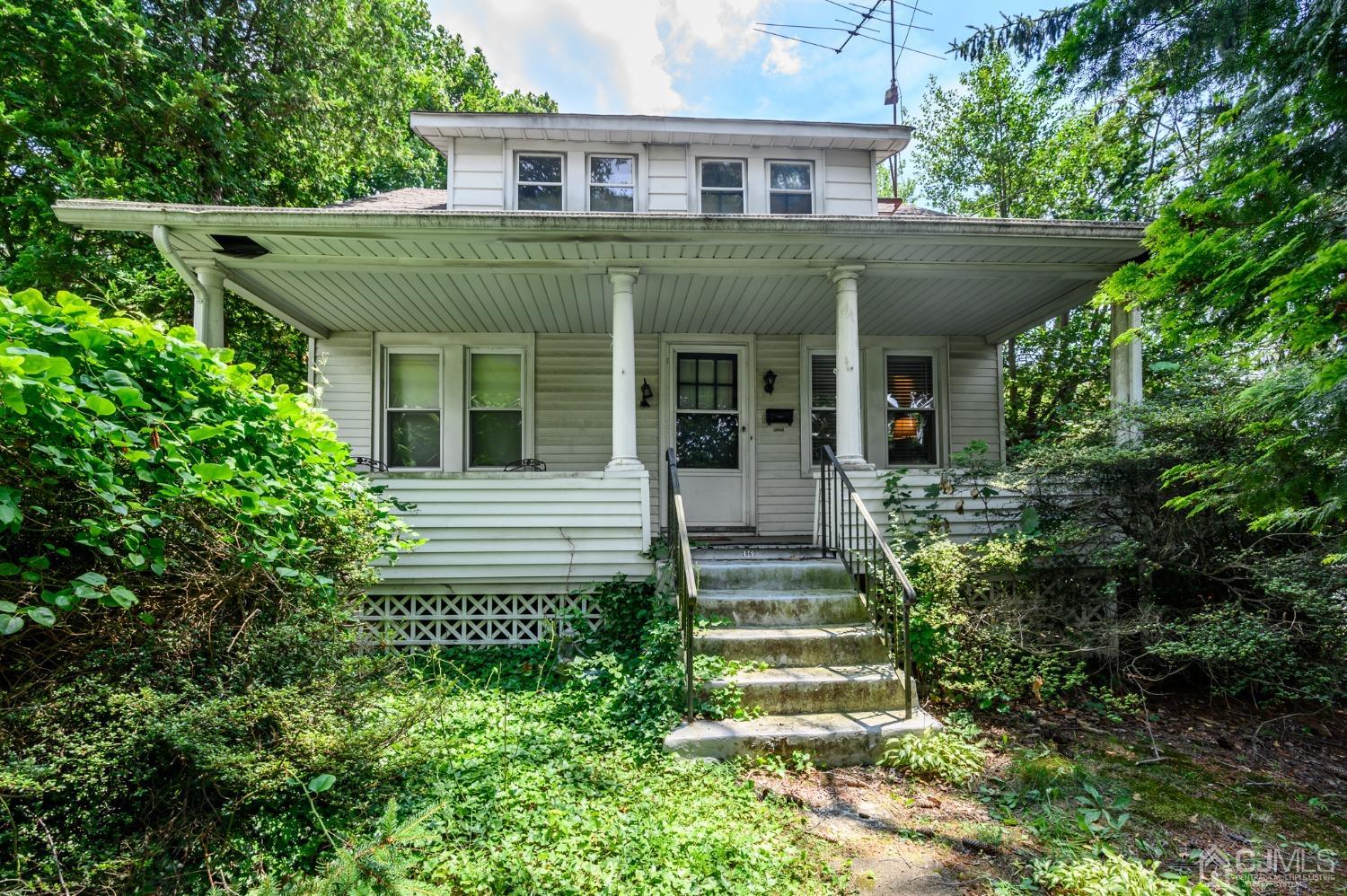 1860 Pennington Road Ewing, NJ 08638 - Photo 1 of 35 a view of a house with brick walls and potted plants