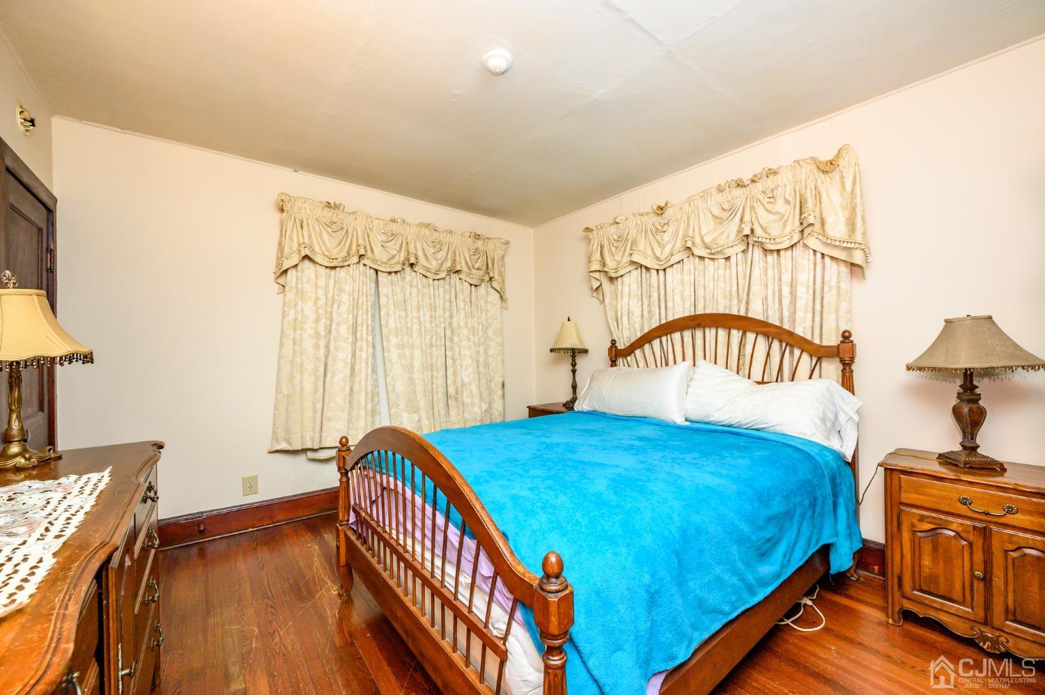 1860 Pennington Road Ewing, NJ 08638 - Photo 17 of 35 a bedroom with a bed and a window