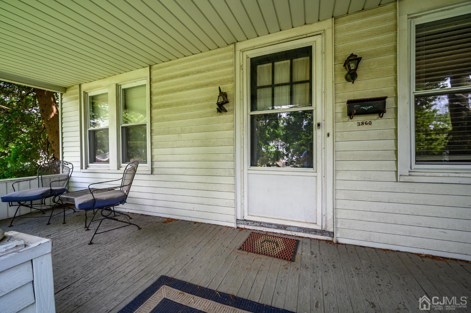 1860 Pennington Road Ewing, NJ 08638 - Photo 2 of 35 a backyard of a house with seating space