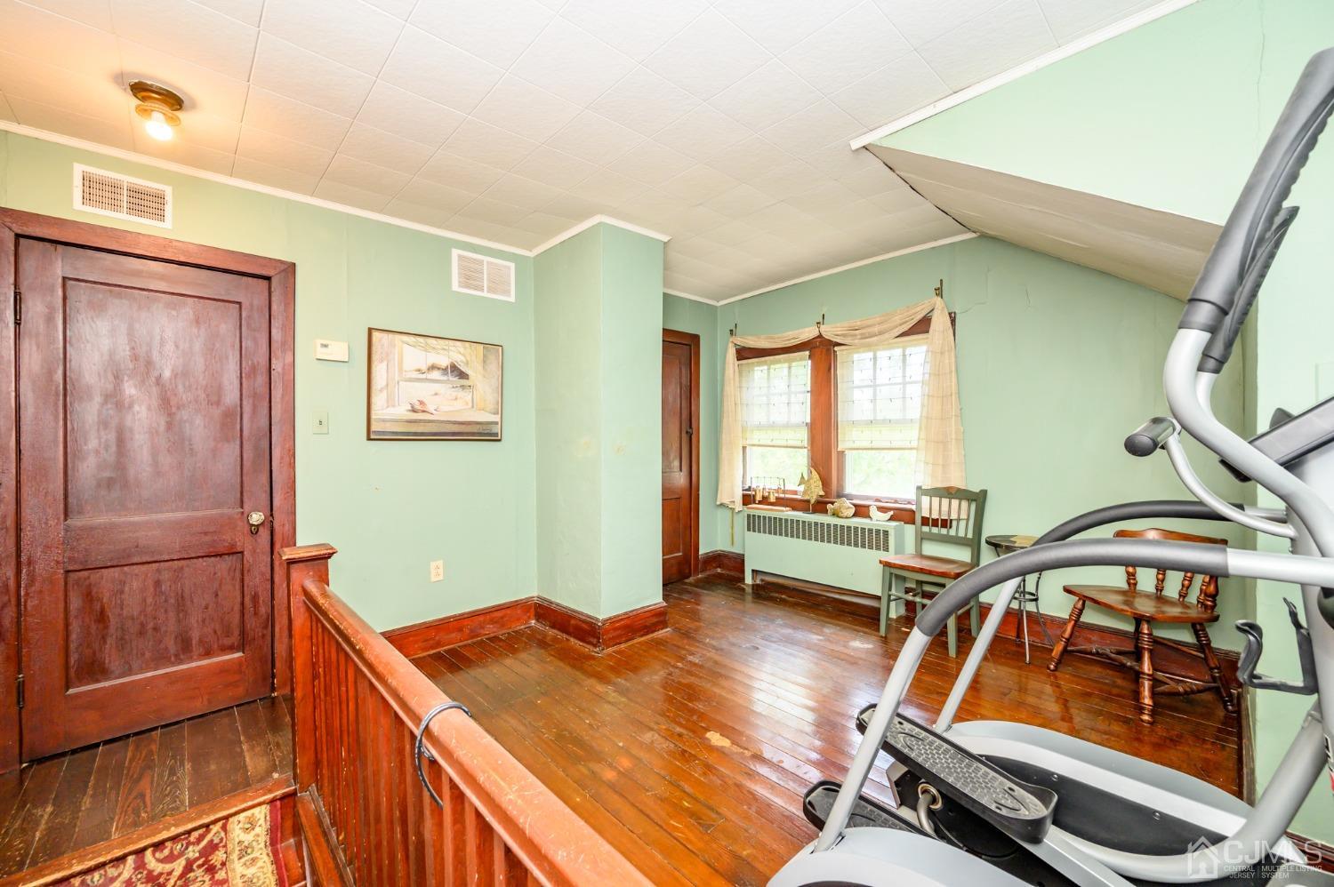 1860 Pennington Road Ewing, NJ 08638 - Photo 27 of 35 a living room with furniture and a window
