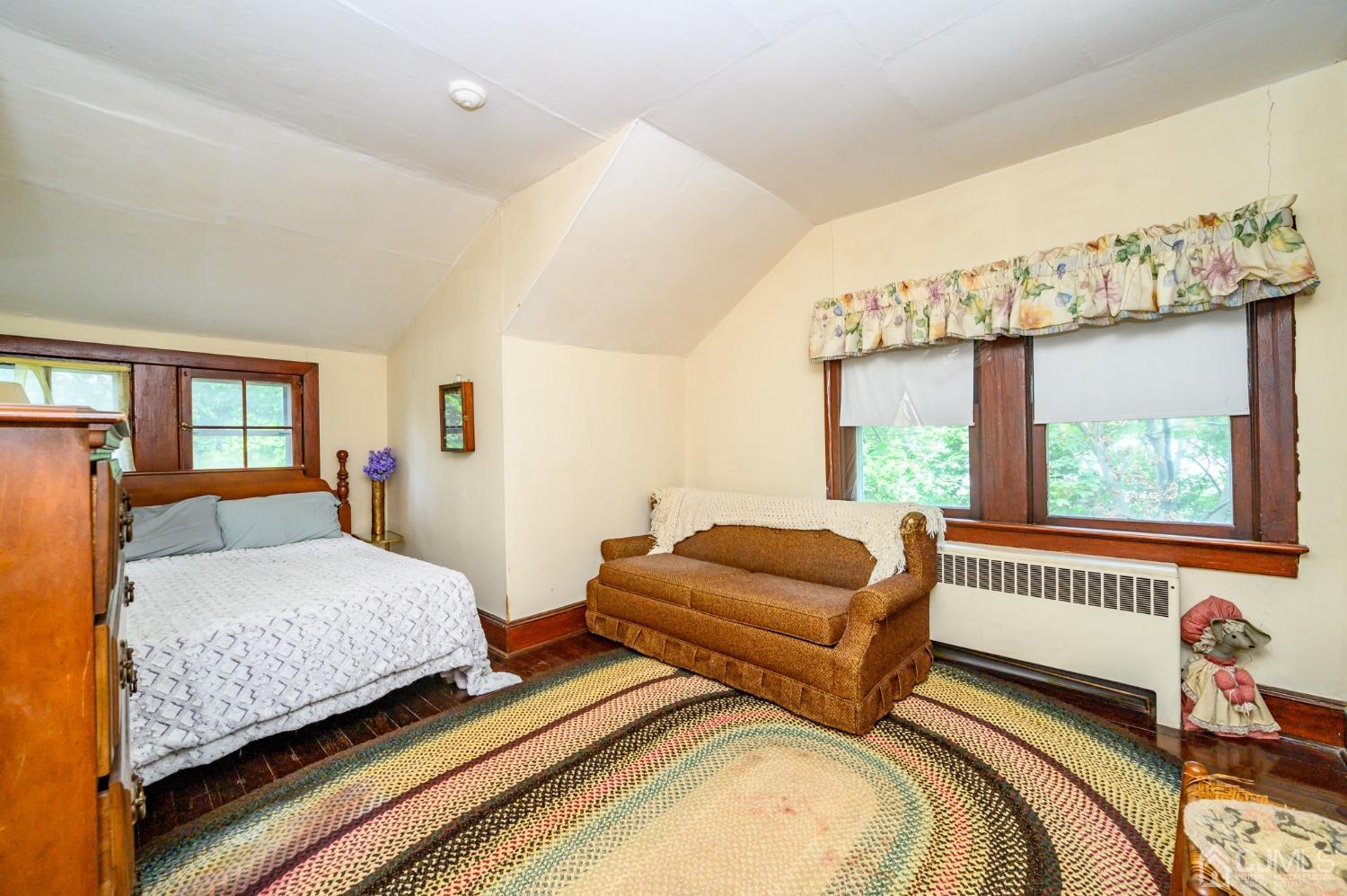 1860 Pennington Road Ewing, NJ 08638 - Photo 28 of 35 a bedroom with furniture and a large window