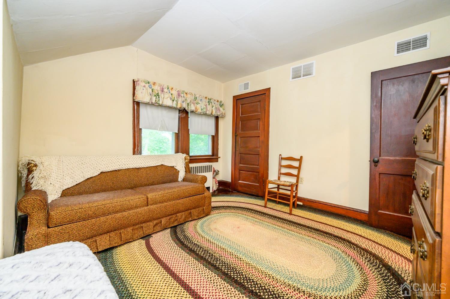 1860 Pennington Road Ewing, NJ 08638 - Photo 30 of 35 a living room with a couch and a table