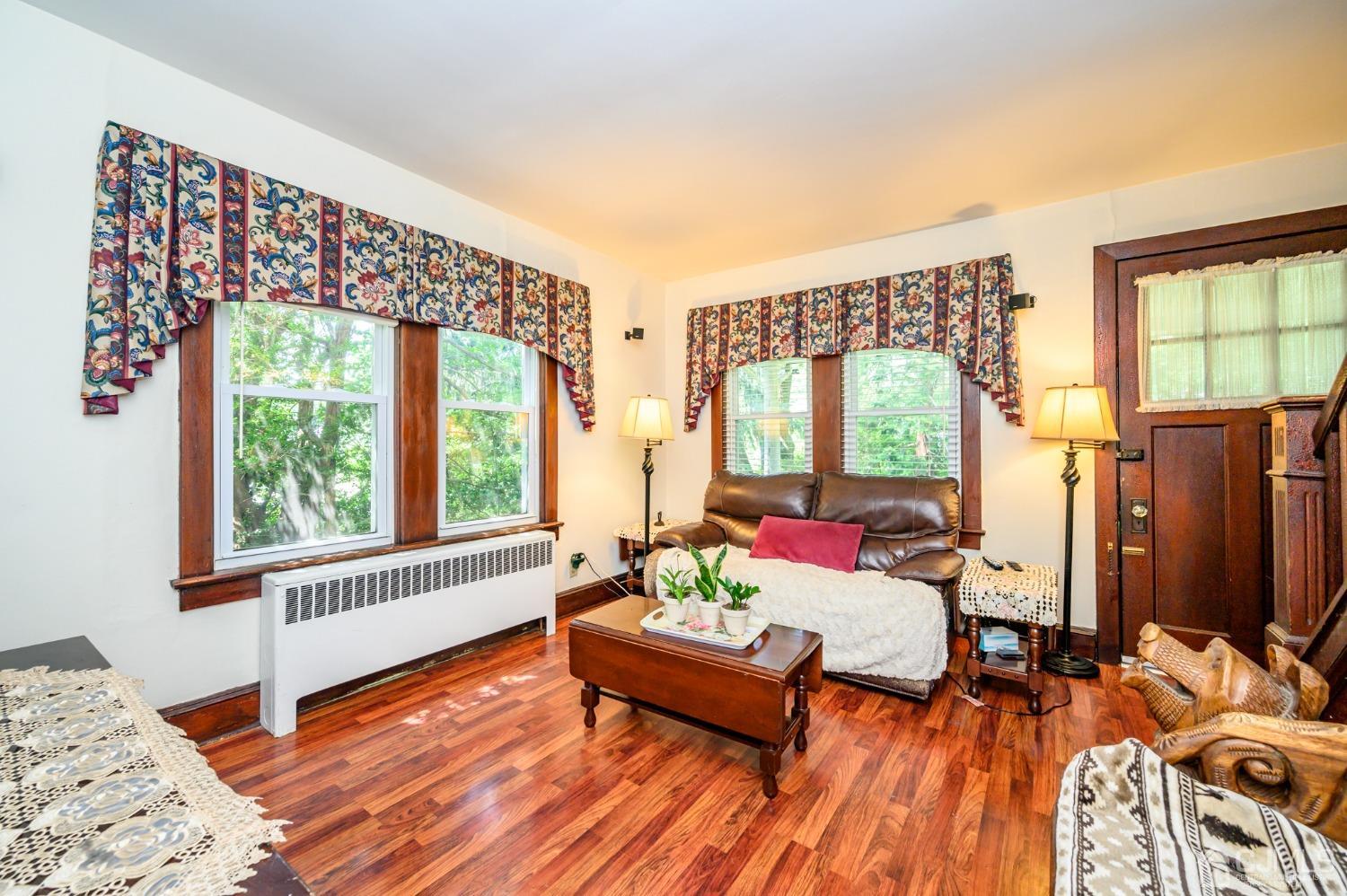 1860 Pennington Road Ewing, NJ 08638 - Photo 6 of 35 a living room with furniture and large windows