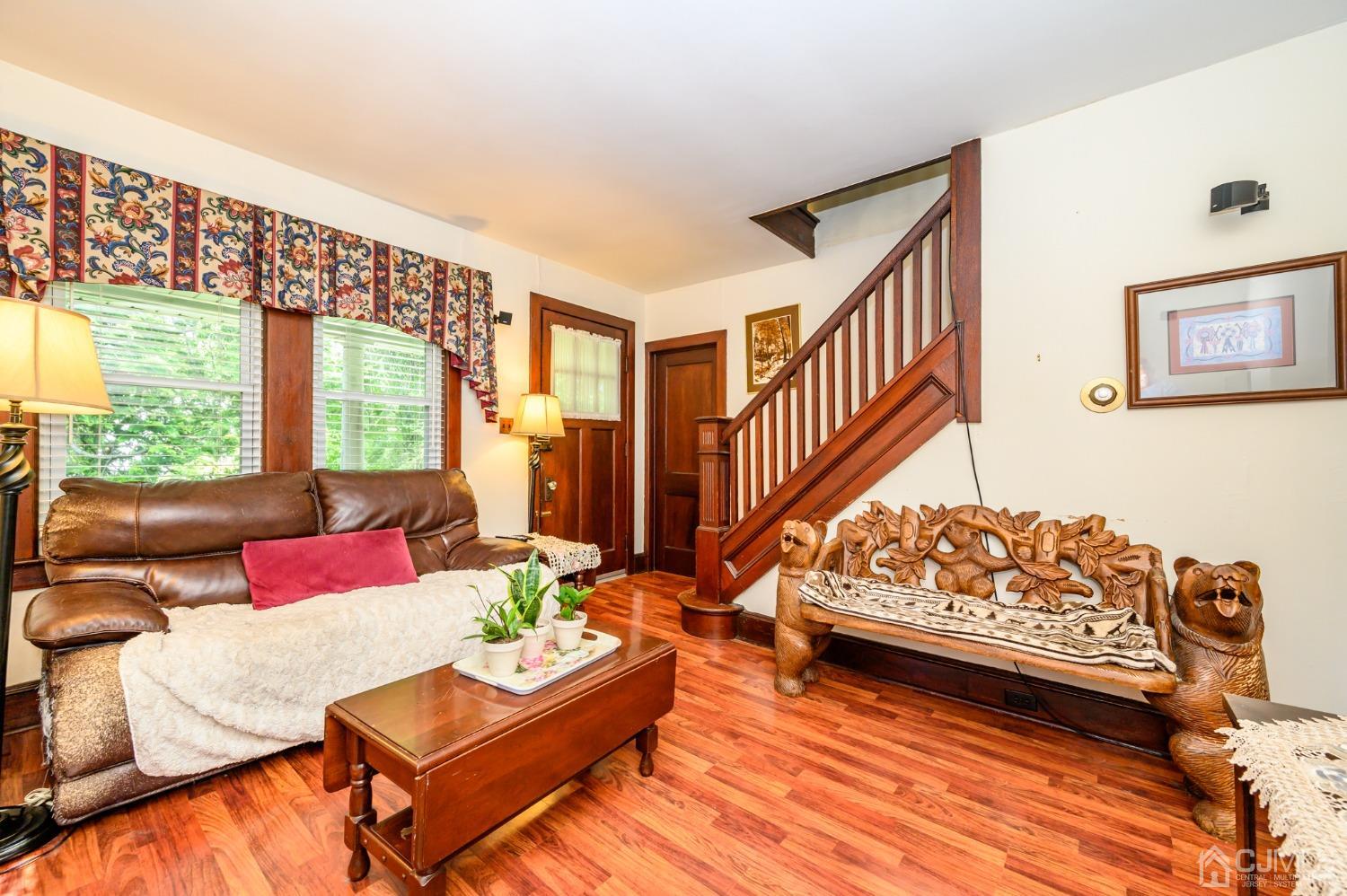 1860 Pennington Road Ewing, NJ 08638 - Photo 7 of 35 a living room with furniture and windows